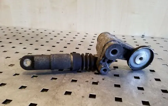 Generator/alternator belt tensioner