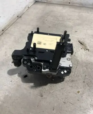 Volkswagen PASSAT B7 Transmission gearbox valve body 02E927770AL