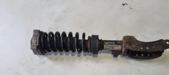 Volkswagen Touareg I Front shock absorber with coil spring 7L6412022