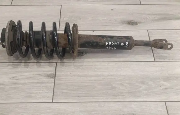 Volkswagen PASSAT B5 Front shock absorber with coil spring 