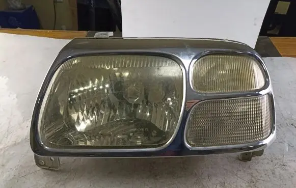 Suzuki Grand Vitara I Headlight/headlamp 10032080 9922690003