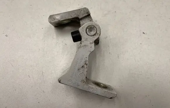 Rear door upper hinge