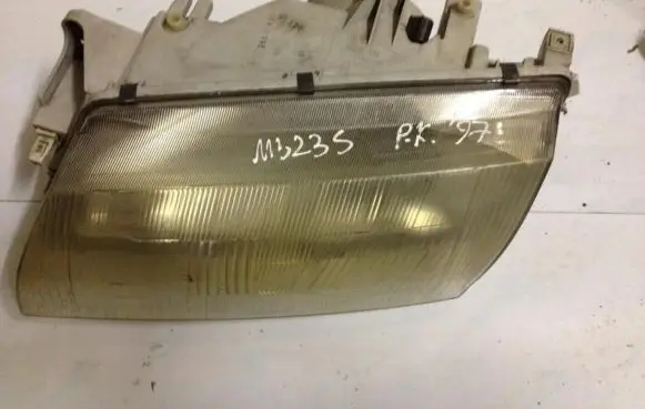 Mazda 323 Headlight/headlamp 1305235336
