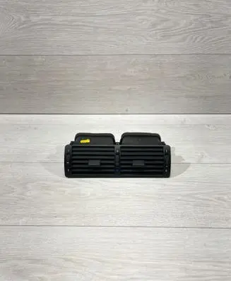 Dash center air vent grill