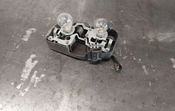 BMW 3 E46 Tail light bulb cover holder 230569L