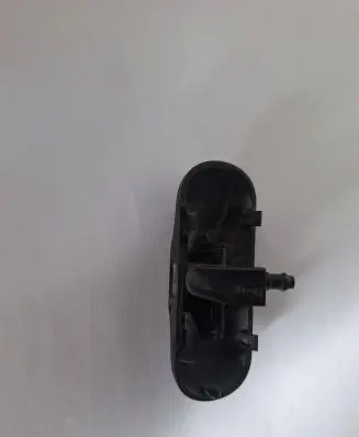 Windshield washer spray nozzle