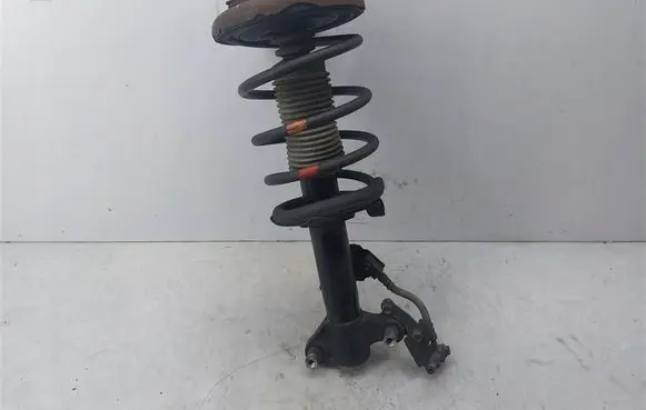 Nissan Primera Front shock absorber with coil spring 