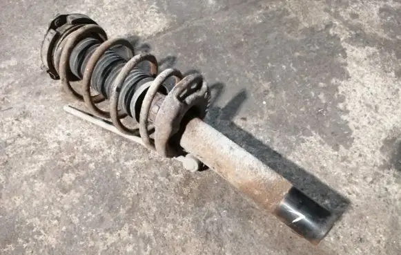Volkswagen Golf V Front shock absorber with coil spring 1T0413031DP