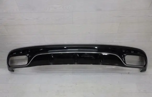 Rear bumper trim bar molding