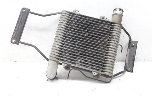 KIA Carens I Intercooler radiator 2827127350