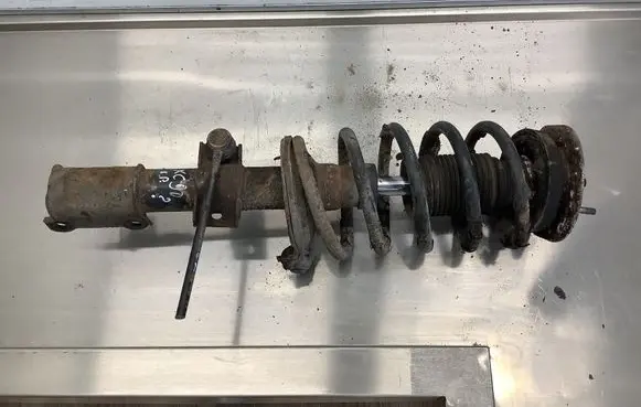 Volvo XC90 Front shock absorber with coil spring 