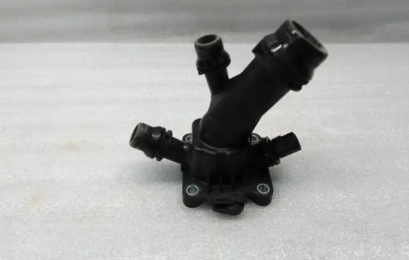 Thermostat/thermostat housing