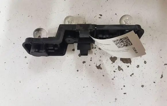 Nissan Almera N16 Tail light bulb cover holder 236873 236874