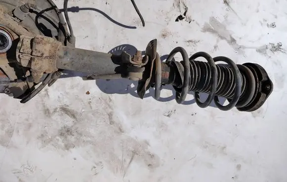 Volkswagen Golf VI Front shock absorber with coil spring 