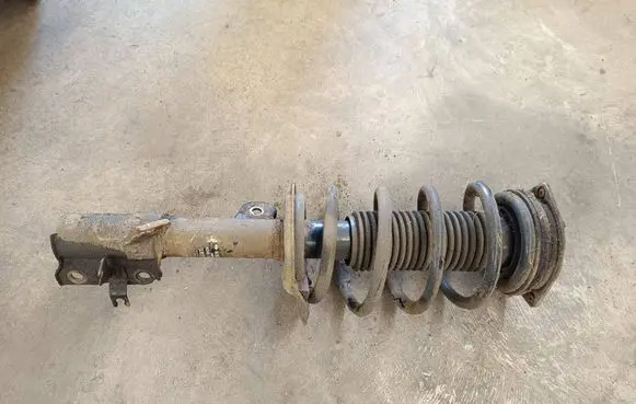 Nissan Qashqai Front shock absorber with coil spring 54303BR01A