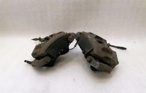 Mercedes-Benz E C207 W207 Front Brake Caliper Pad/Carrier A2044213581