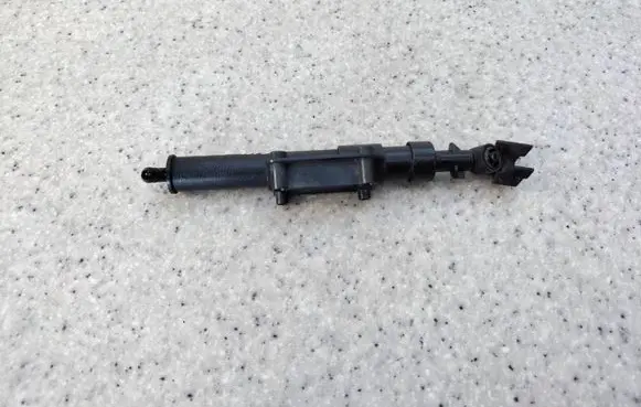Volvo S80 Headlight washer spray nozzle