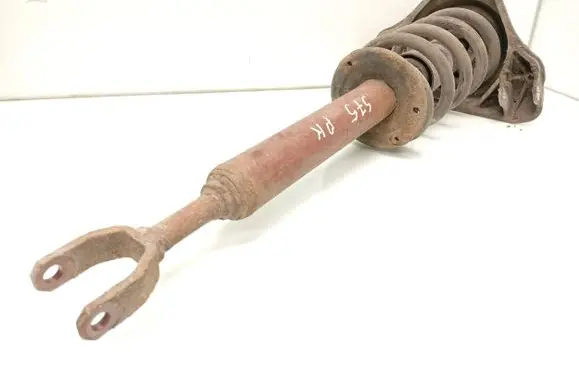Front shock absorber with coil spring