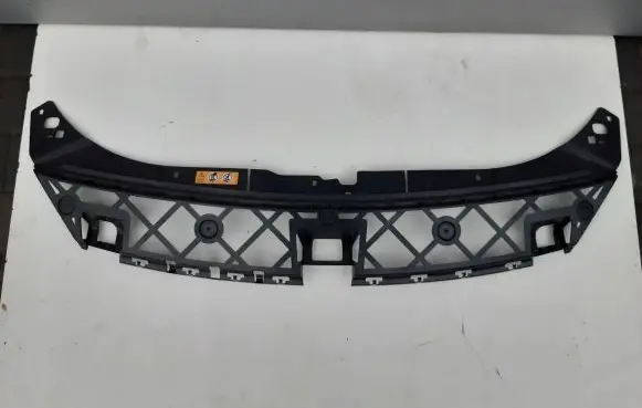 Engine bonnet/hood lock trim molding