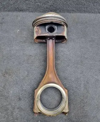 Piston with connecting rod