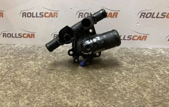 Thermostat/thermostat housing