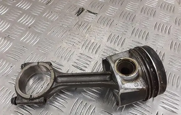 Piston with connecting rod