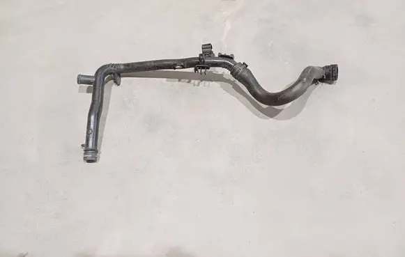 Volkswagen PASSAT B7 Engine coolant pipe/hose 03L121065AJ