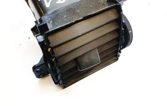 Dash center air vent grill