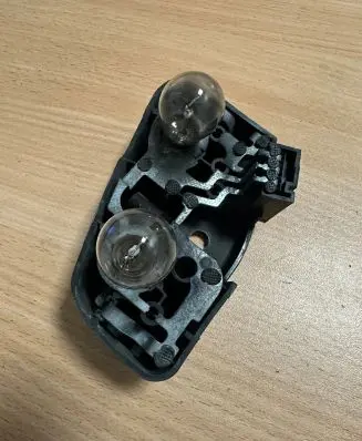 BMW 3 E46 Tail light bulb cover holder 388569L