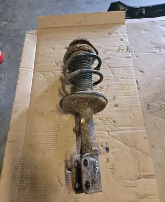 Toyota Corolla Verso E121 Front shock absorber with coil spring 