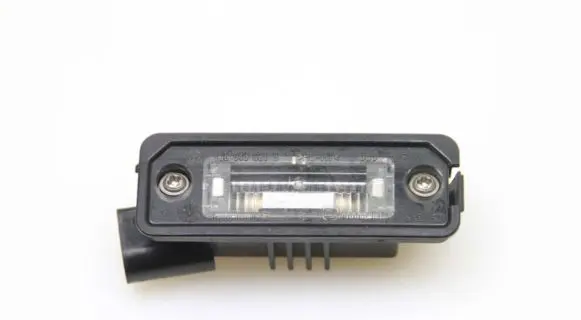 Volkswagen Golf V Number plate light 1J6943021B