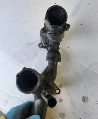 Thermostat/thermostat housing