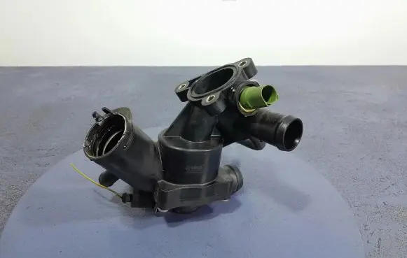 Thermostat/thermostat housing