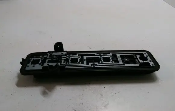 Tail light bulb cover holder