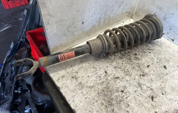 Mercedes-Benz E W211 Front shock absorber with coil spring A2113200113