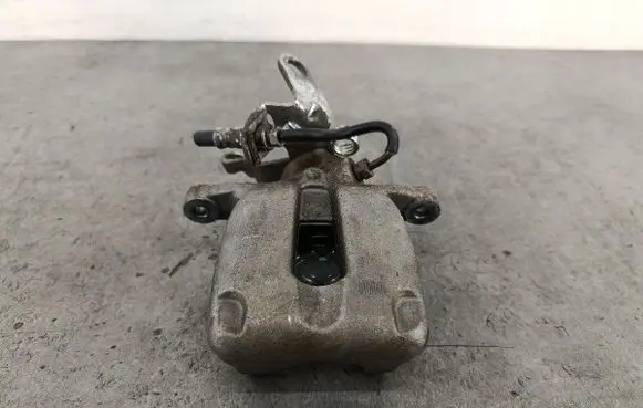 Volkswagen Touran I Rear brake caliper 