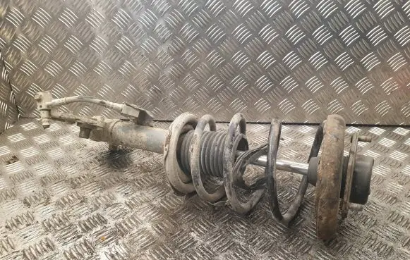 Nissan Primera Front shock absorber with coil spring