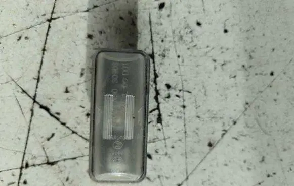 Subaru Legacy Number plate light 30903