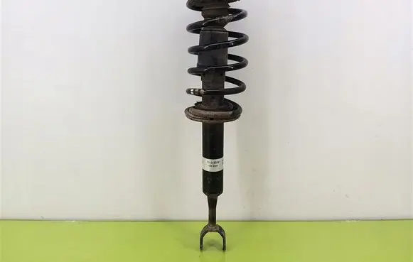 Audi A4 S4 B5 8D Front shock absorber with coil spring 19119939