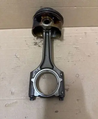 Volkswagen Golf VII Piston with connecting rod 06LD