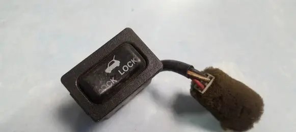 Mazda 626 Tailgate opening switch 