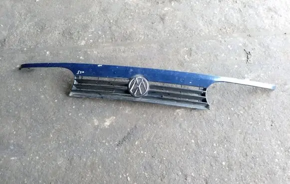 Volkswagen Golf III Front bumper upper radiator grill 1H6853653