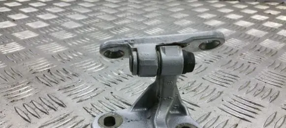Rear door upper hinge
