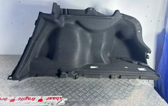 Trunk/boot lower side trim panel