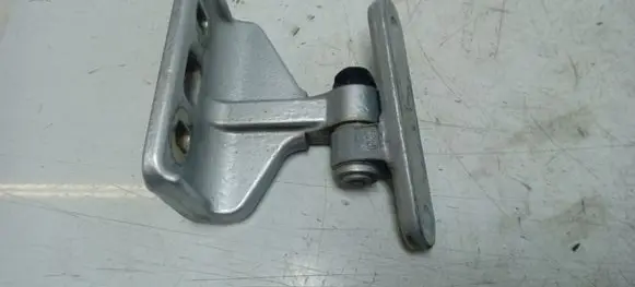 Rear door upper hinge
