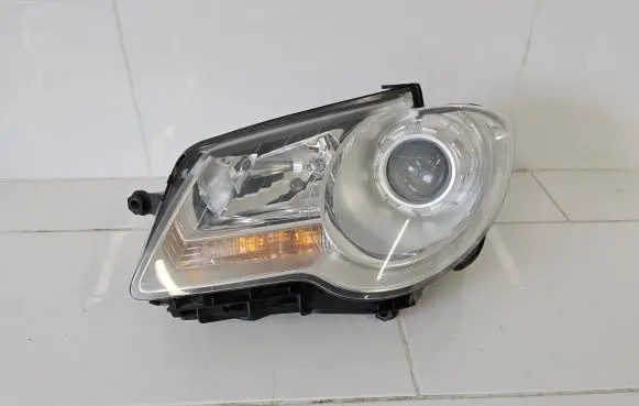 Volkswagen Touran I Headlight/headlamp 1T1941005B 0301233201