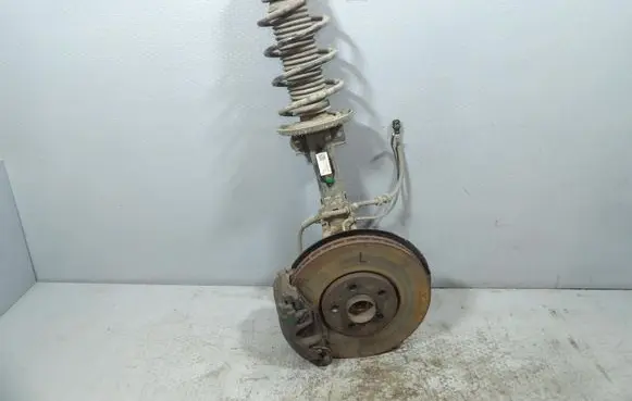 Skoda Rapid (NH) Front shock absorber with coil spring
