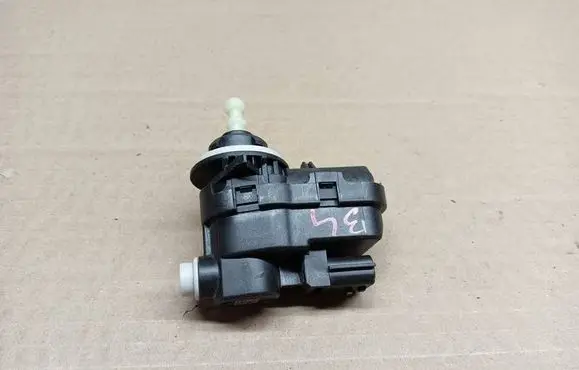 Suzuki Swift III Headlight level adjustment motor 92004464
