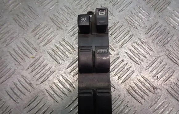 Nissan Almera Tino Front door window switch trim 