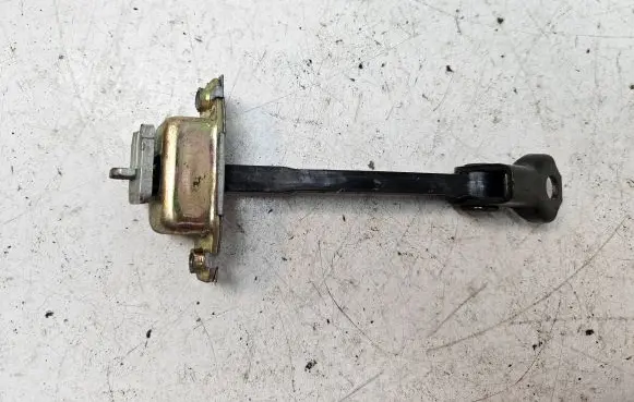 Toyota Yaris Rear door check strap stopper